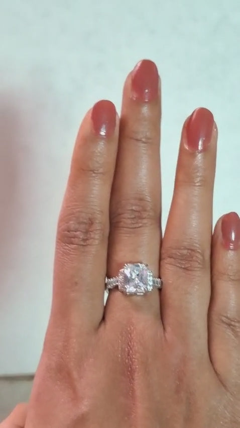 Emerald-Cut Solitaire Engagement Ring with Halo and Baguette Band