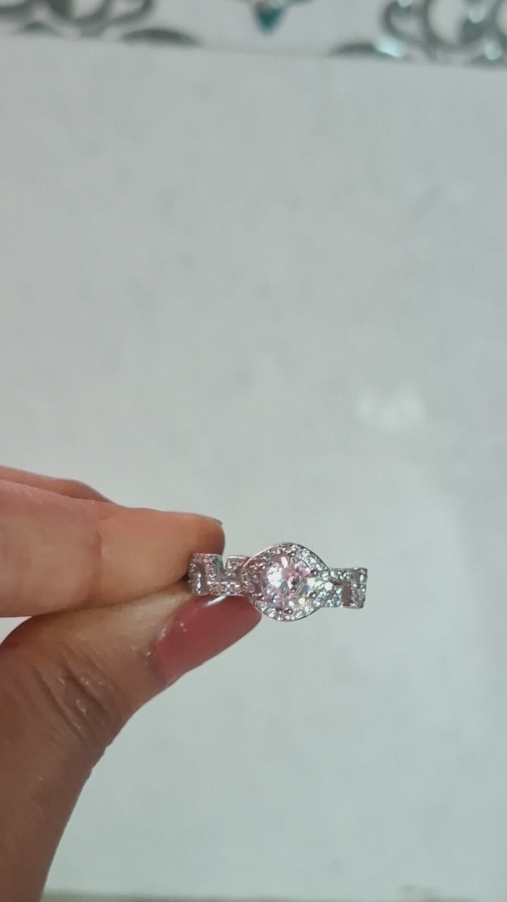 The Timeless Solitaire Engagement Ring with Brilliant Halo Diamond Detailing