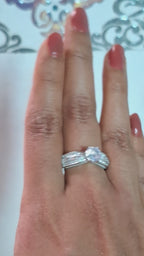 The Elegant Emerald-Cut Solitaire Engagement Ring with Pavé Diamond Halo